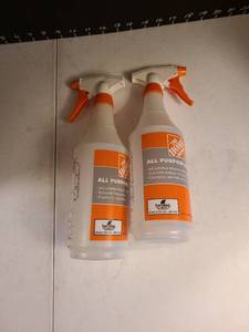 lot 1113 image: Two empty spray bottles