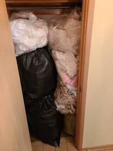 lot 1115 image: Five bags packing paper, 1 small bag styrofoam peanuts