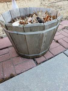 lot 5005 image: Wooden planter 15 x 20 dia with plastic pot