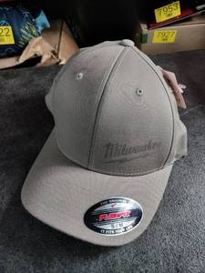 lot 7957 image: Milwaukee Gray Flex Fit Hat SL (Small Grease Spot on Top)