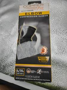 lot 7975 image: Copper Fit Work Gear Elbow Compression Sleeve LXL