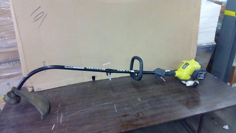 lot 6646 image: Ryobi 2 cycle full crank gas powered weed eater