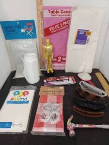 lot 344 image: Table Covers, Eyeglasses, Hammer, Gold Man and More