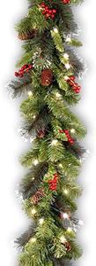 lot 7590 image: National Tree Company Pre-Lit Artificial Christmas Garland, Green, Crestwood Spruce, White Lights, Decorated with Pine Cones, Berry Clusters, Plug In, Christmas Collection, 9 Feet