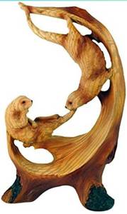 lot 14408 image: 7.25 Two Playful Sea Otters Scene Faux Wood Figurine, Brown