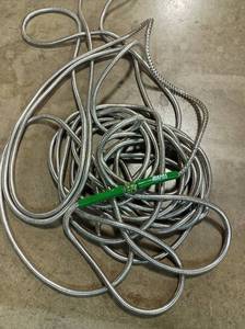 lot 14514 image: Metal Garden Hose, Approximately 60-75 Feet
