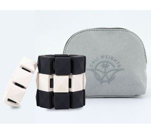 lot 59391 image: Retail - $53.57 Cali Weights set of four 14-lb Weight Set