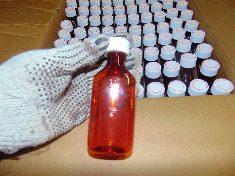 lot 9056 image: (1) case PE-4A, 4 oz. Amber Plastic Oval medicine Bottles, approx 90 bottles per case