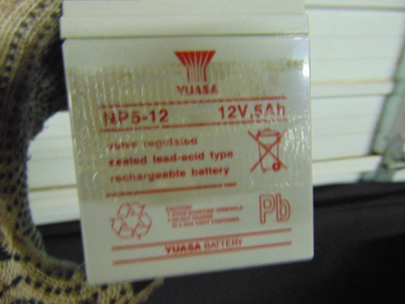 lot 9095 image: (3) ct. lot working batteries, ( Lithonia Lighting ELB 06042 6 volt, (2) Yusa Np5-12 12 volt