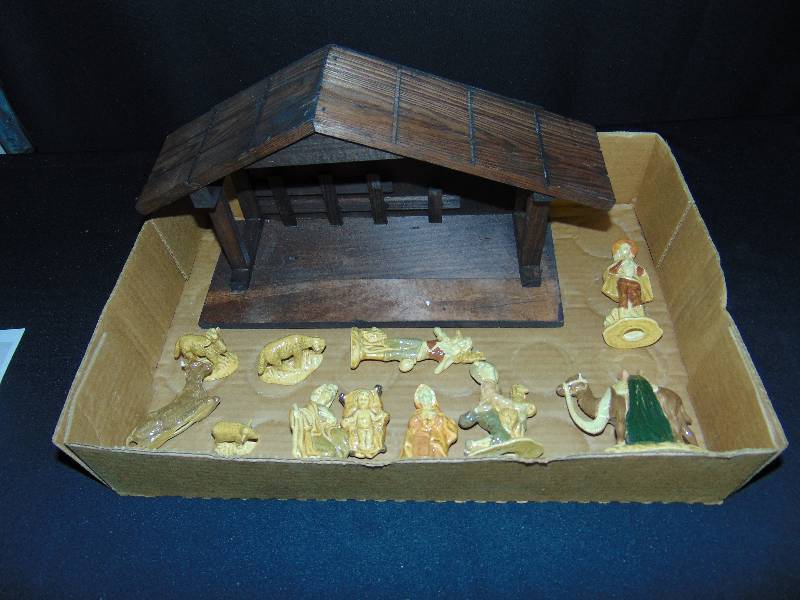 lot 9109 image: (11) piece Ceramic nativity set with wooden Creche