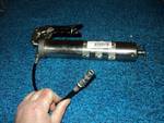 lot 9031 image: new Grease Gun with rubber hose