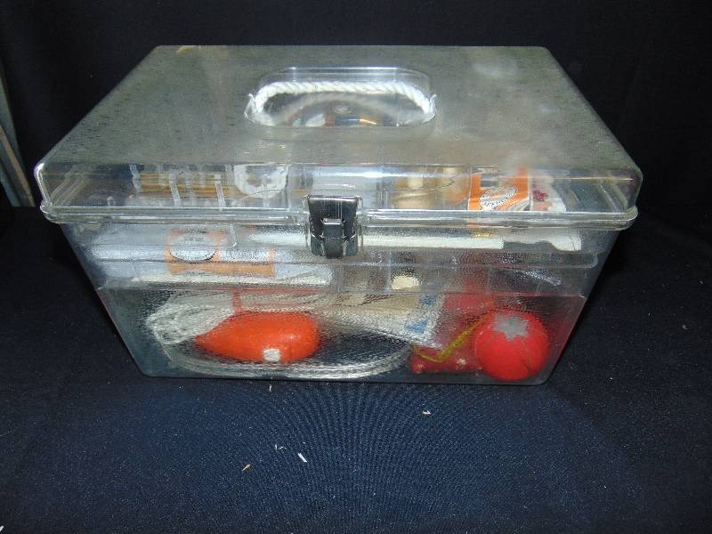 lot 9131 image: Large plastic sewing box with rope handle and sewing accessories including electric scissors