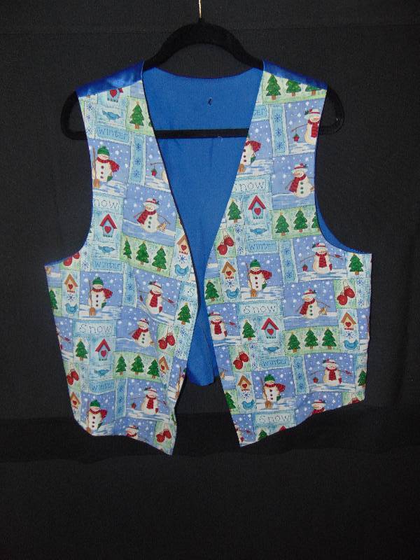 lot 9143 image: Ladies Handmade Christmas Theme Vest, size large