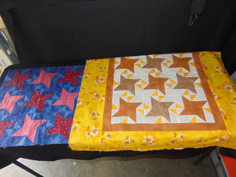 lot 9149 image: (2) ct. lot miniature quilt tops (1) 18 x 18, (1)31 x 31