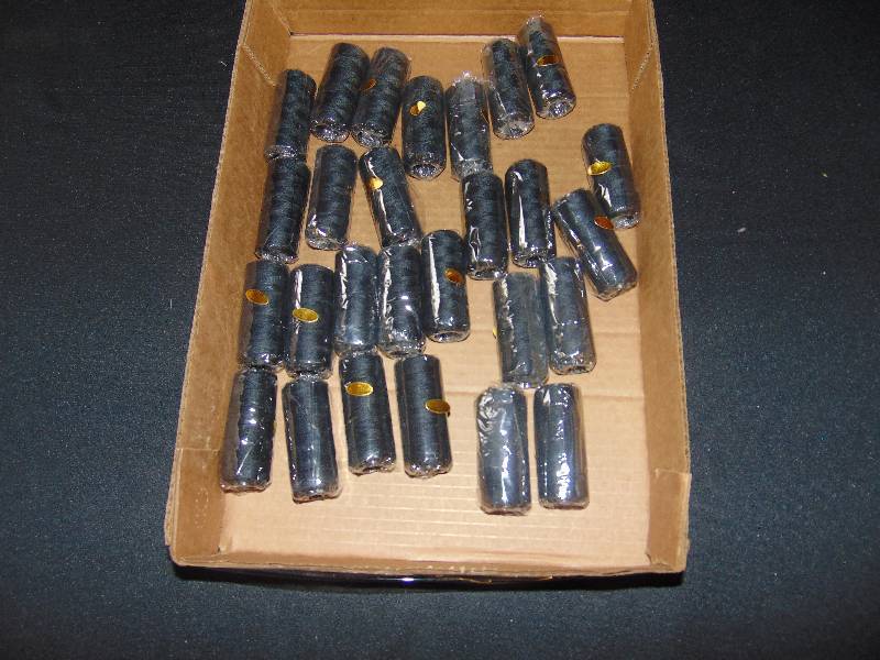 lot 9158 image: (27) rolls new black weaving thread