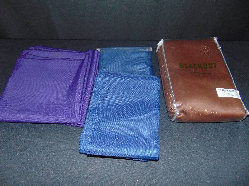 lot 9176 image: Mixed lot home decor 91) Brown Black-out Curtain Panel 52 x 84, (4) purple napkins 19 x 20, (10) navy Blue sashes 8 x 6