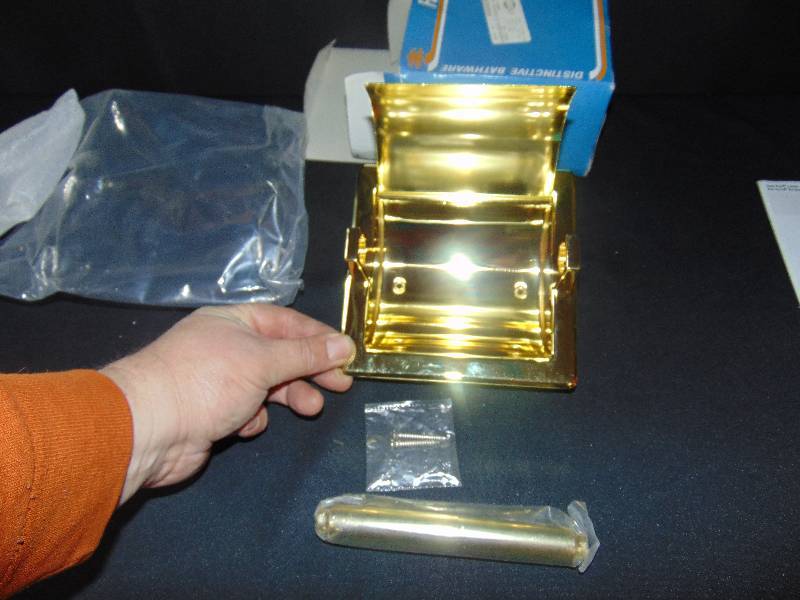 lot 9242 image: (1) recessed toilet tissue holder w hood, polished brass new in box