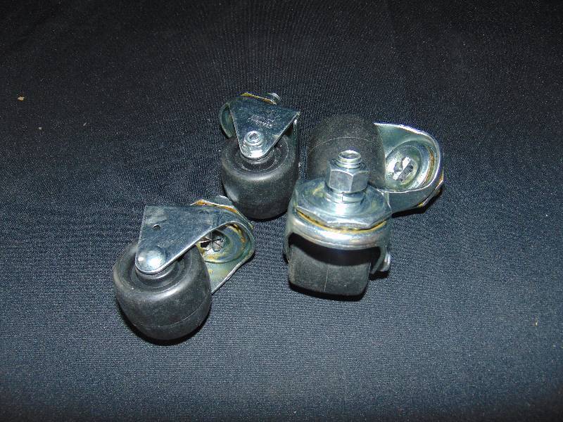 lot 9252 image: (4) ct. lot black caster wheels, screw-in mount wheels, 2 diameter w 12 diameter bolt, nut and locking washer