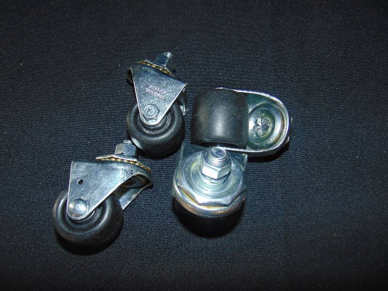lot 9254 image: (4) ct. lot black caster wheels, screw-in mount wheels, 2 diameter w 12 diameter bolt, nut and locking washer
