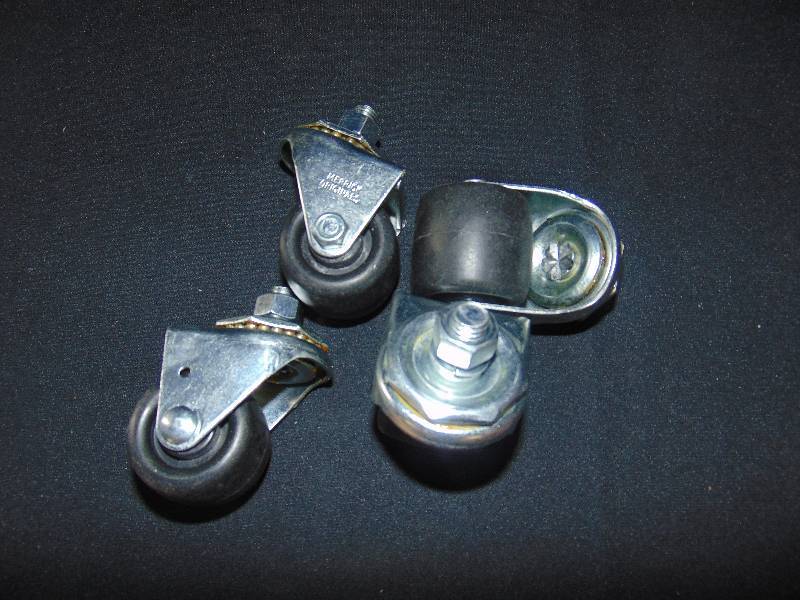 lot 9255 image: (4) ct. lot black caster wheels, screw-in mount wheels, 2 diameter w 12 diameter bolt, nut and locking washer