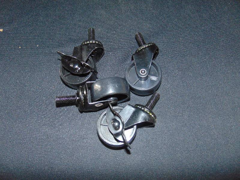 lot 9257 image: (2) ct. lot caster wheels 2 lock, 2 do not, 2 diameter w 38 x 1 post