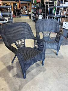 lot 1018 image: Black caravan plastic wicker patio chairs (2)