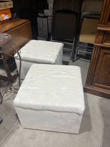 lot 1024 image: Rolling wood upholstered storage ottomans (2) 16 x 21 x 21 in