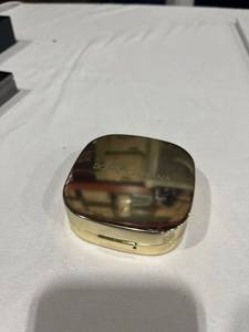 lot 1049 image: Dolce and Gabbana tan 140 pressed compact .52 oz