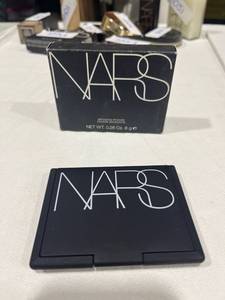 lot 1054 image: Nars bronzing powder .28 oxygen