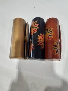 lot 1089 image: Lipstick holders