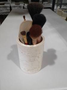 lot 1091 image: Marble holder with makeup brushes. Lancome, Ellen Tracy and more