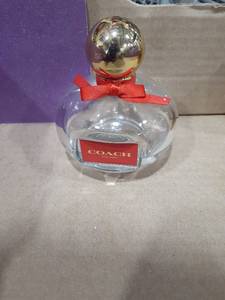 lot 1094 image: Coach perfume. Not full