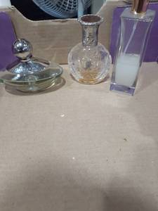 lot 1097 image: Ralph Lauren perfume (very little), Ralph Lauren, Seascape (13) and Ellen Tracy perfume (full)