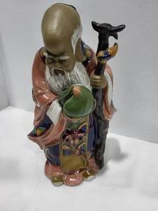 lot 1105 image: Glazed ceramic oriental statue 10x5