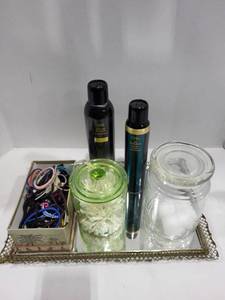 lot 1225 image: Vanity mirror tray, glass jars, hair ties, Oribe dry shampoo, shaping mousse