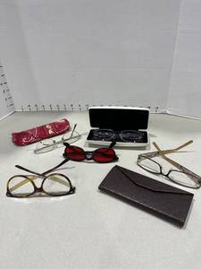 lot 1546 image: Versace and Gucci and assorted glasses