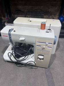 lot 1592 image: Janome sewing machine