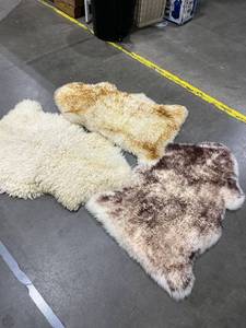 lot 1430 image: Fur rugs (3) approximately 41 x 27 in each