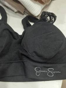lot 1603 image: Ladies tank tops size XL. (1) Jessica Simpson sports bra.. size 1X