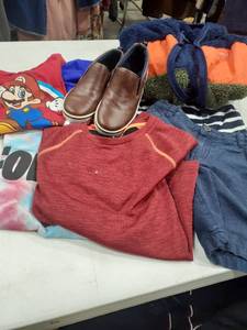 lot 1614 image: Childrens clothes. Some 5T, Eddie Bauer coat 1012, and Nautica shoes size 13