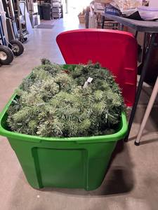 lot 1745 image: Green and red holiday storage tote and lid with lighted garland