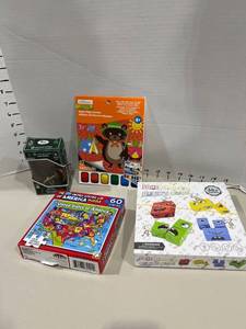 lot 1752 image: Face Change Rubiks Cube and other games