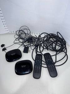 lot 1774 image: Logitech Harmony hub stations (2) with 2 remote sensors and remote controls