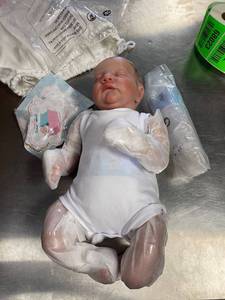 lot 68019 image: 20 inch realistic newborn, soft body, boy, eyes closed, excellent condition