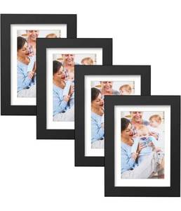 lot 31416 image: Homuguz 5x7 Black Wood Picture Frames Pack of 4 with 4x6 Opening Mat, Real Glass, Wall Hanging or Table Top Display