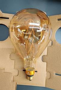 lot 31491 image: GE Lighting VintaStyle LED Light Bulb, Warm Candle Light, Amber Glass, Medium Base, PS52 Light Bulb, 6.5 Watts (1 Pack)