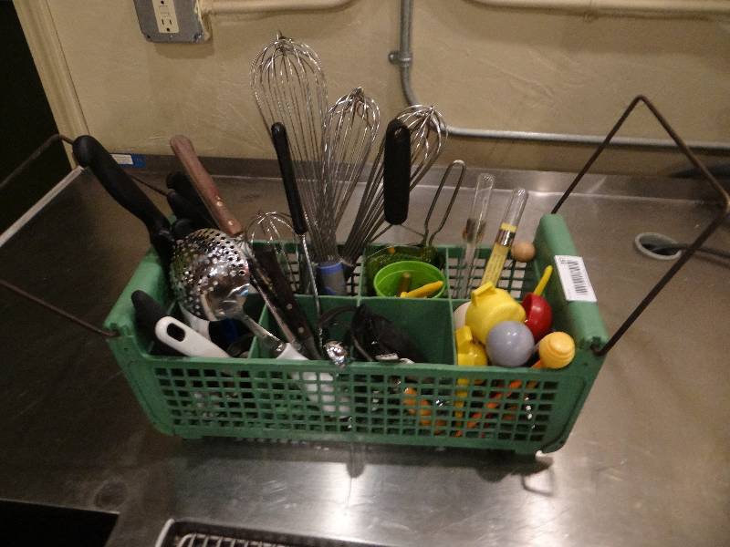 lot 167 image: Large Lot of Knives, Wisks, Peelers, Thermometers, & Kitchen Utensils in Wash Caddy.