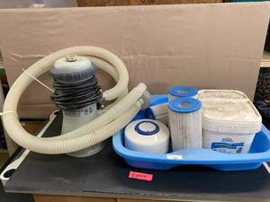 lot 1580 image: Pool Filters, Chlorinating Tablets, Pump, Life Jackets