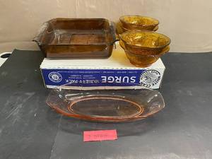 lot 1630 image: Amber Glass Bowls (4), Anchor Hawking Baking Dish, Pink Depression Bowl (1)