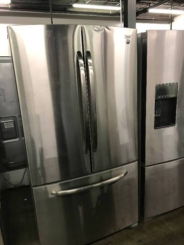 lot 1369 image: GE Stainless Front 3 Door Household Refrigerator